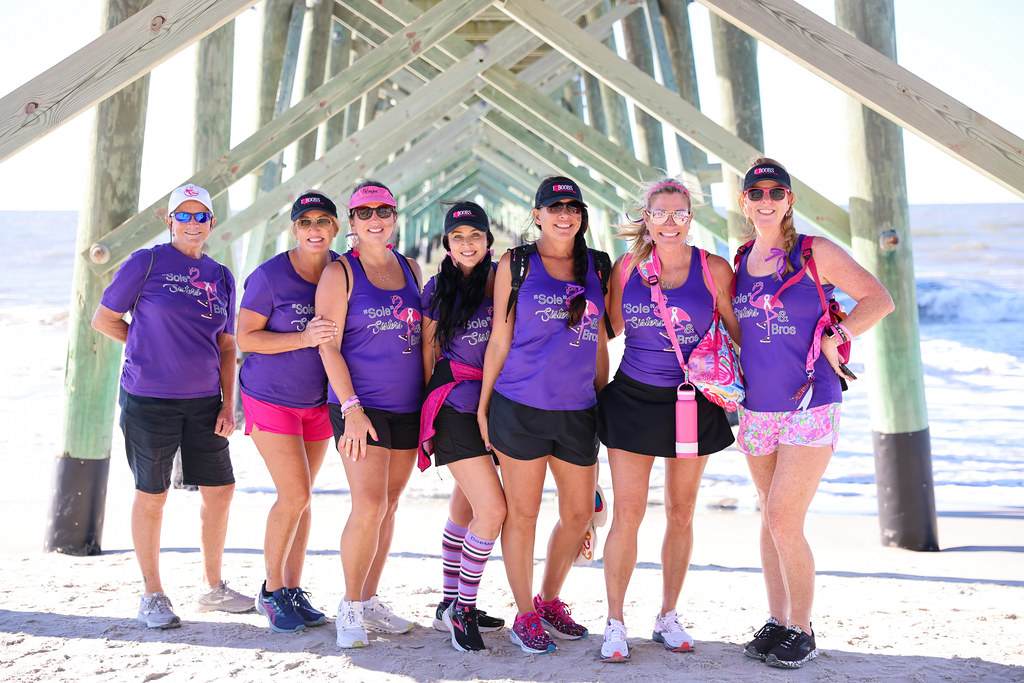 Pledge the Pink group under the Oak Island pier