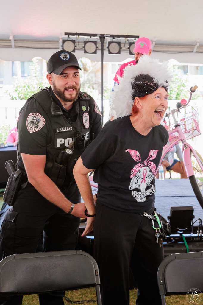 Officer and FlockStar laughing at the auction