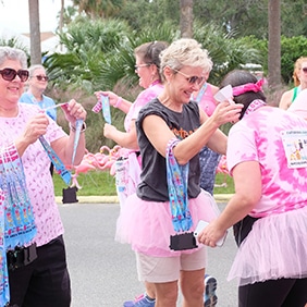 Pass out medals, sweaty hugs, and celebrate with us at the finish line party