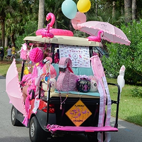 Drive our professional photographers around the course in your golf cart